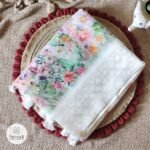 Pushpavika White Floral Organza Saree with Kucchu Detailing